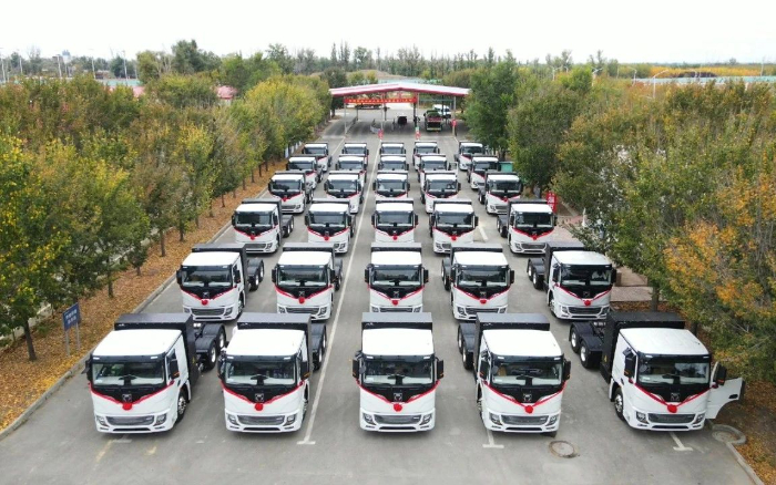 脱碳“换”绿进行时！三亿体育新能源重卡批量交付西北