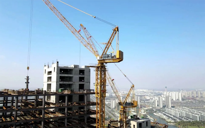 180米高！三亿体育塔机“建”证世界级“大象”成长记